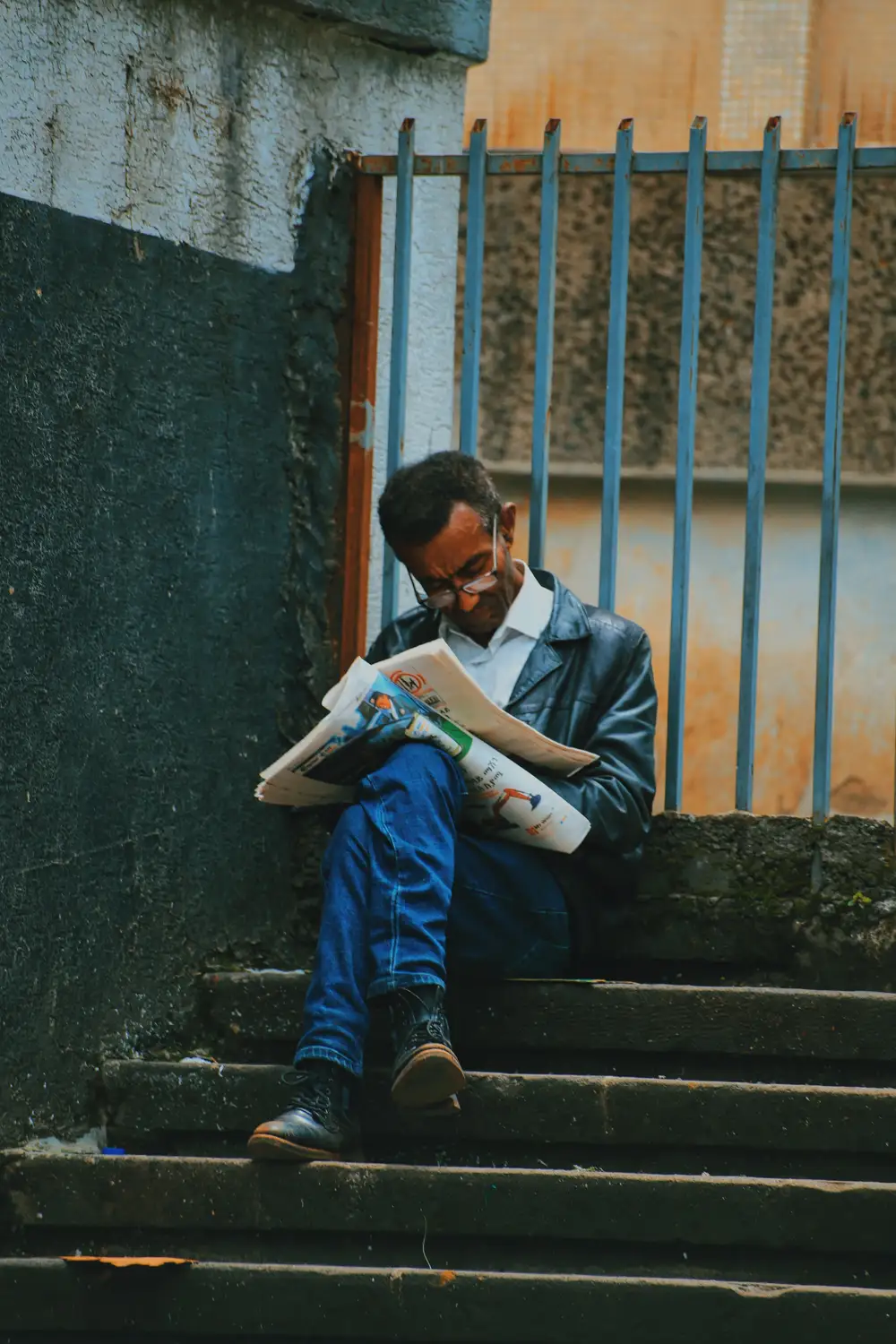 man reading newspaper