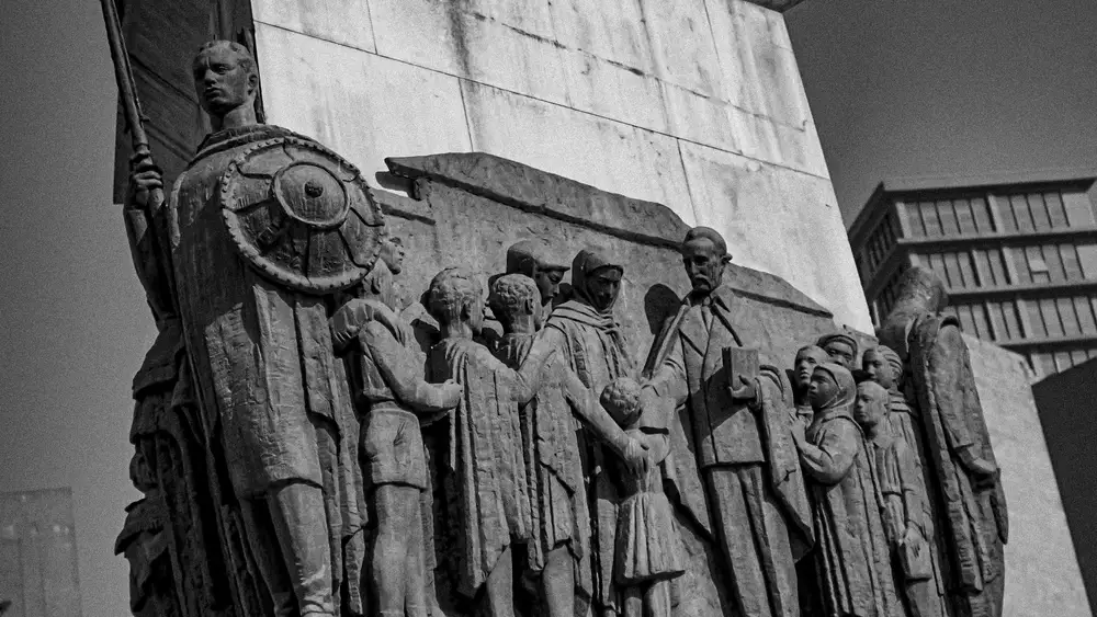 statues in front of a buiding