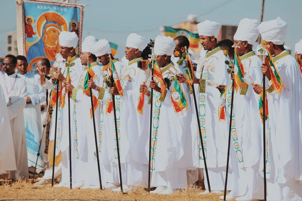 Men in white at Genna Festival