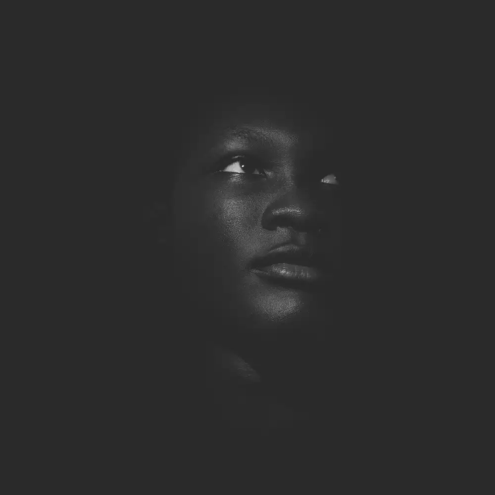 Black woman in the dark