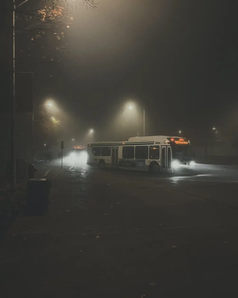 Bus with the headlights on