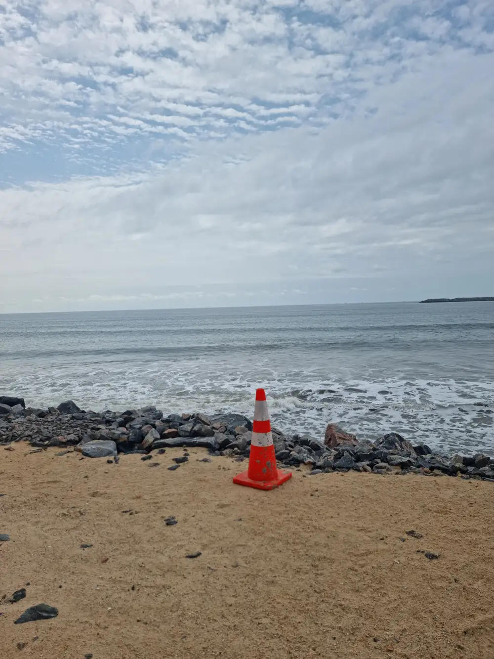 Traffic cone at the beach