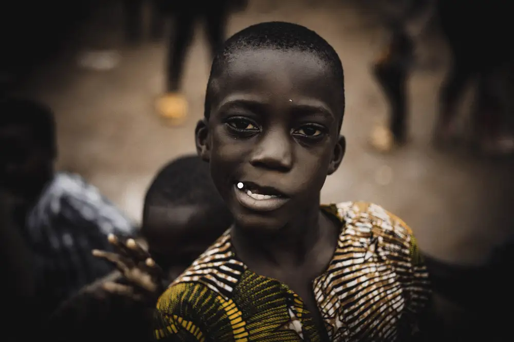 A boy chewing something