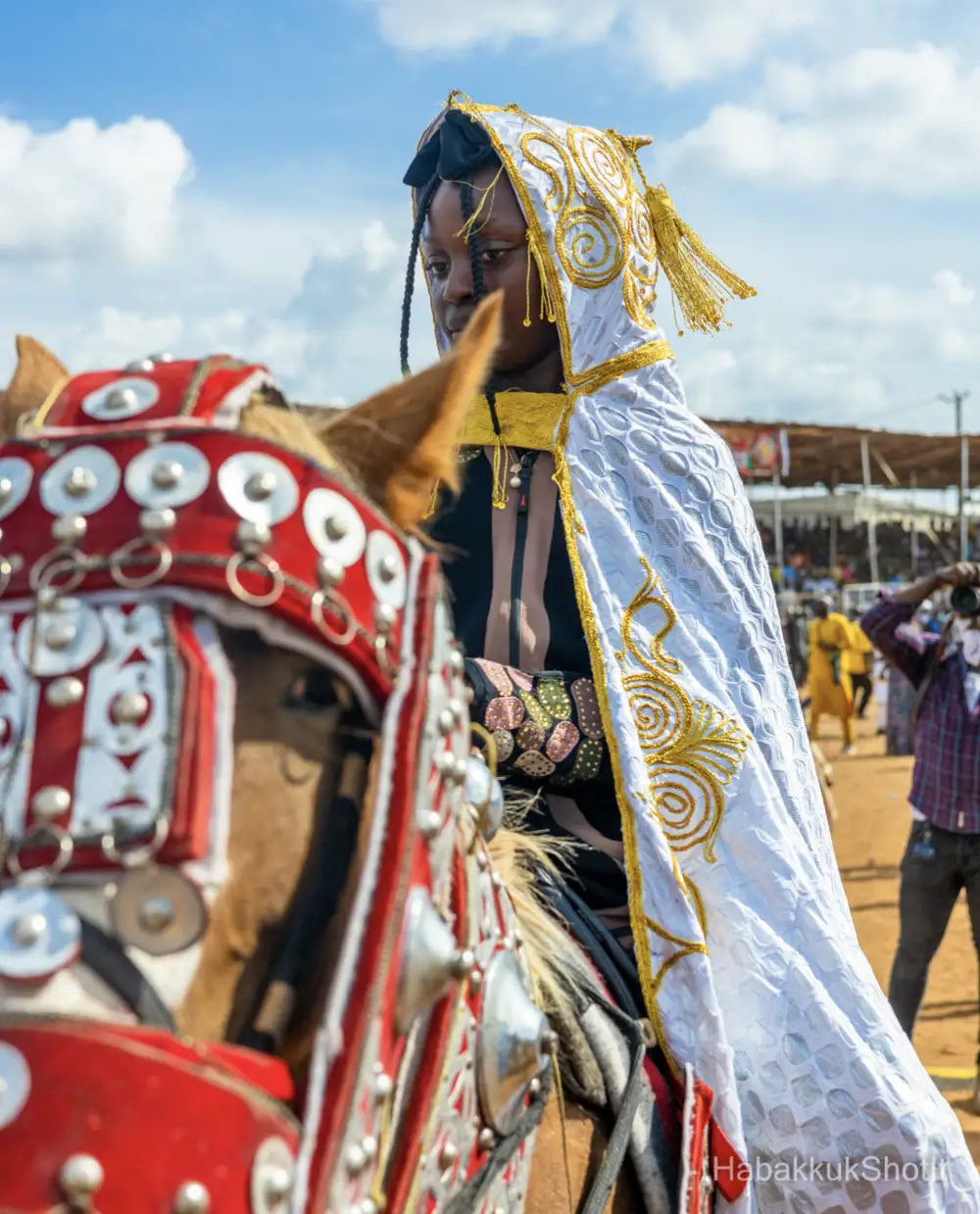 a-young-lady-riding-on-a-royal-horse-at-the-ilorin-durbar-festival-2023-GM5xmN