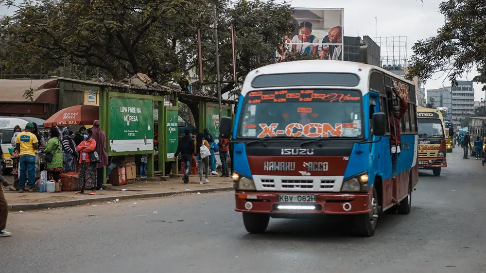 Large commercial bus conveying passengers