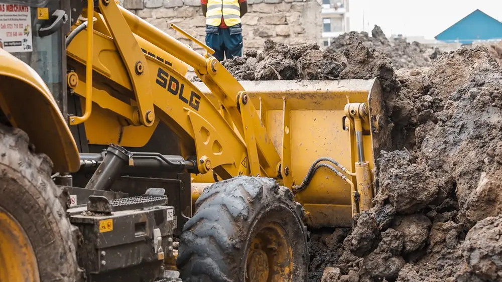 Bulldozer digging dirt for construction