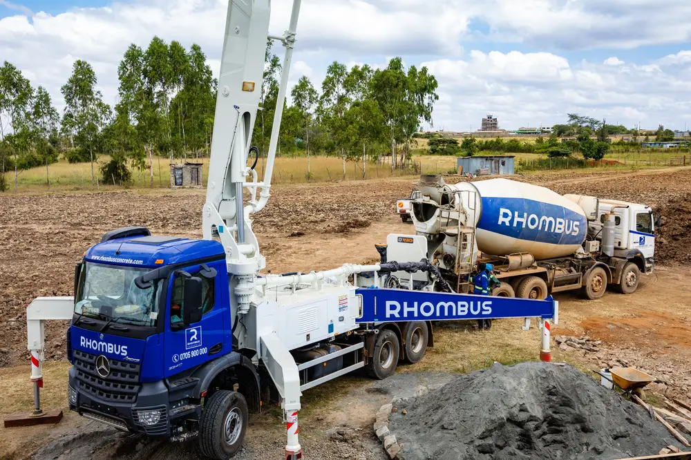 Two construction trucks at a site