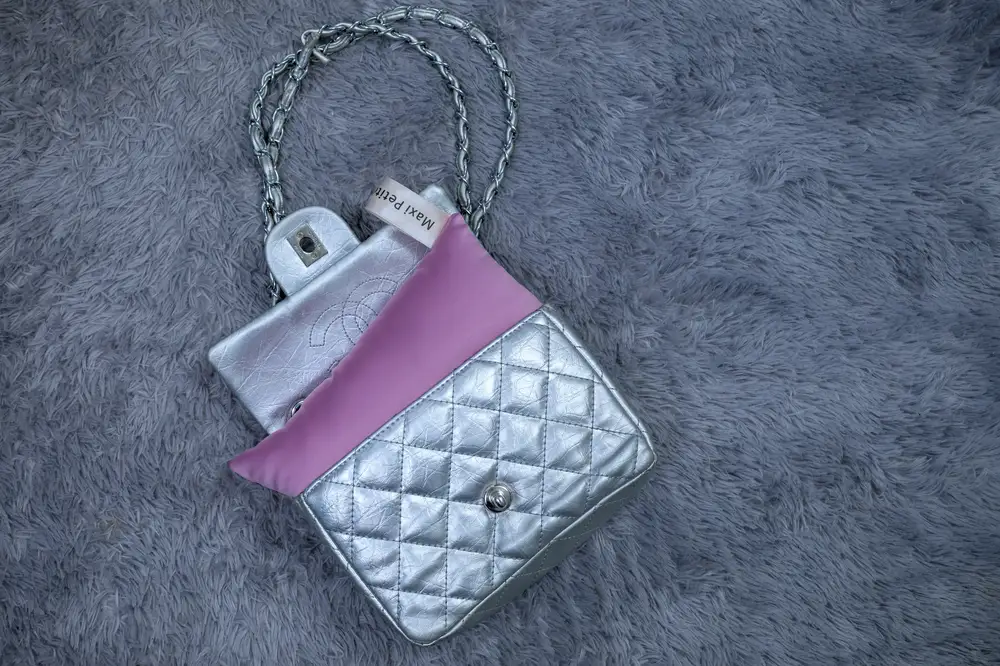Silver colored leather bag