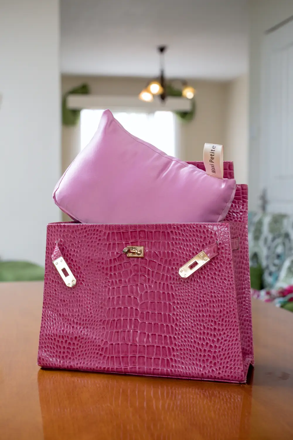 Pink leather bags and a silk pillow