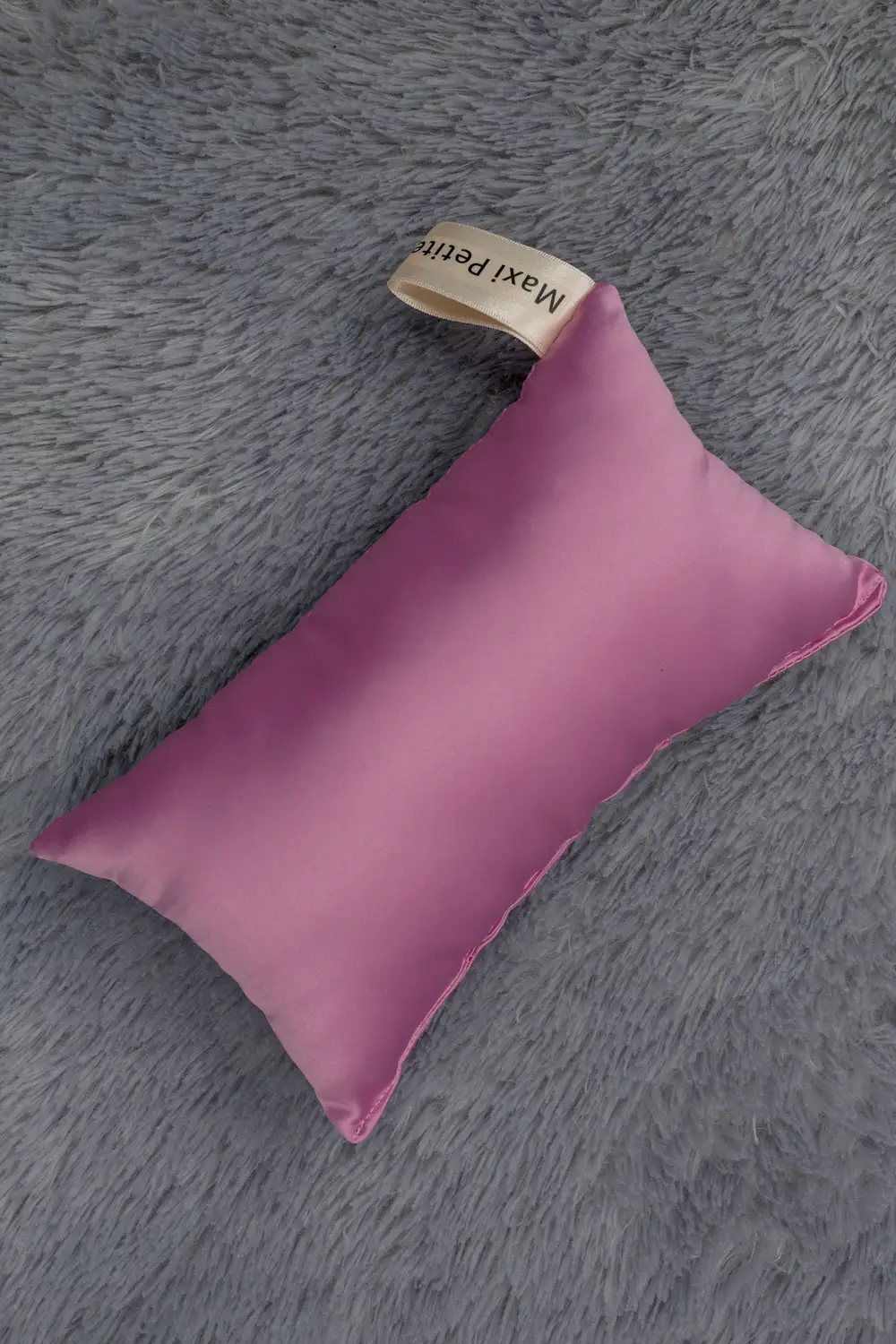 Purple colored silk pillow