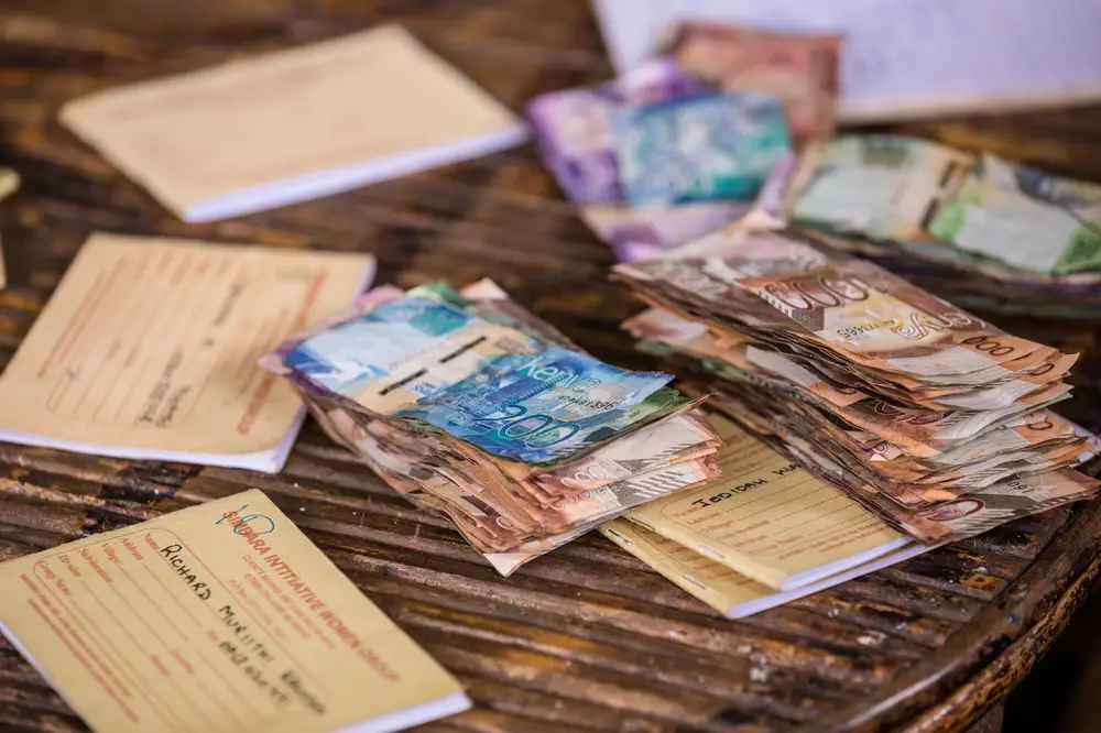 Kenyan currency stacked on a table