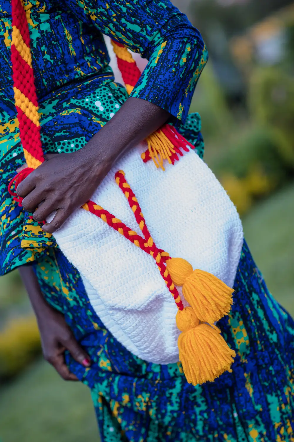 Woman carrying a hand made crochet bag