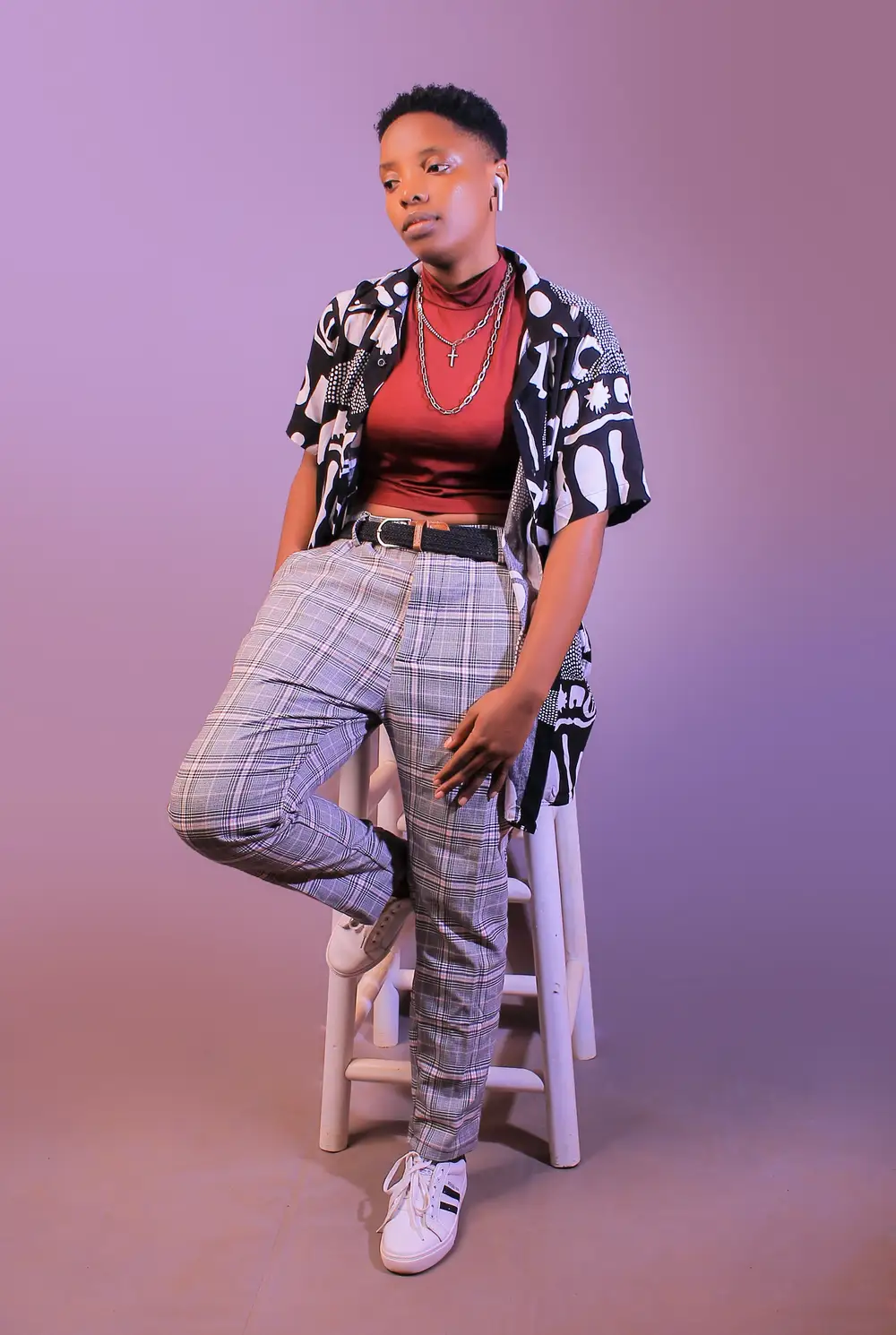 woman wearing a checked trouser and belt