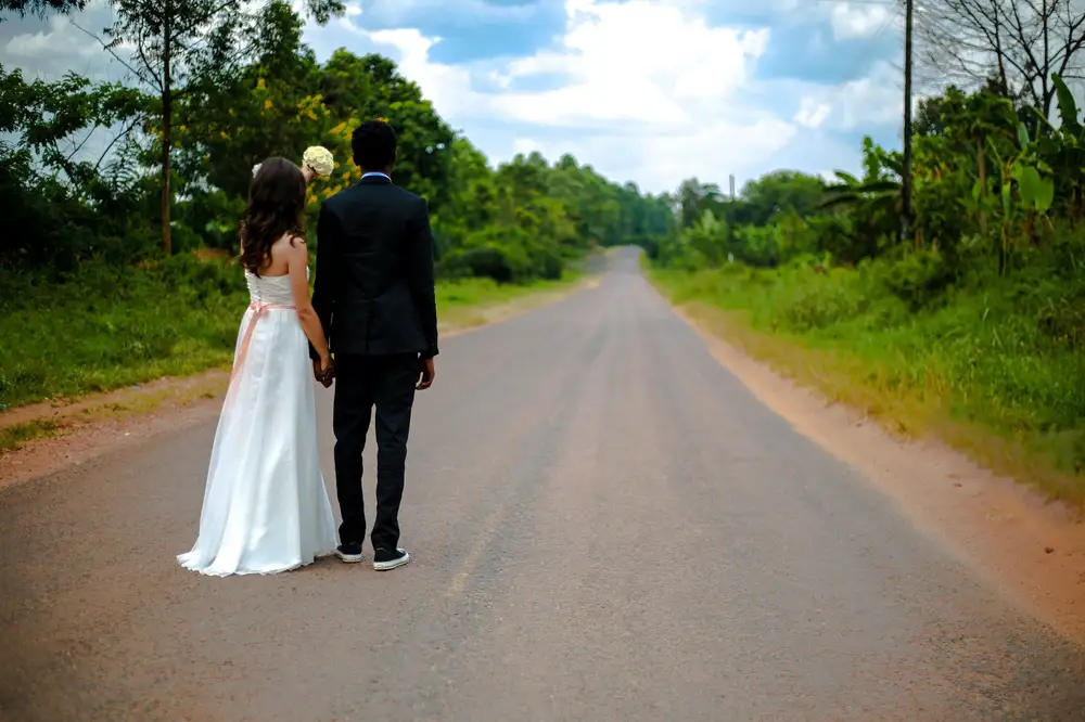 Young couple on an empty road