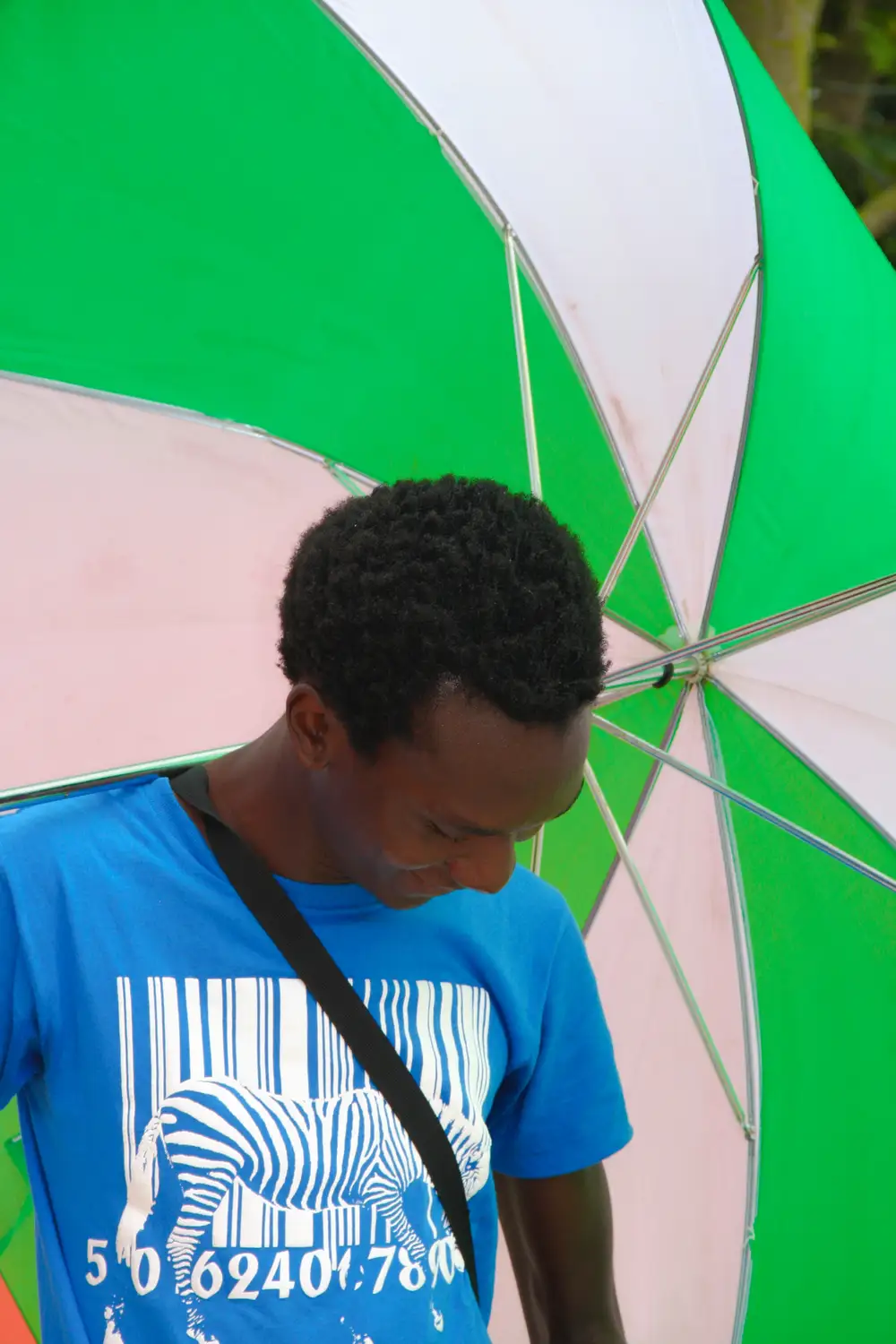 Young man under an umbrella