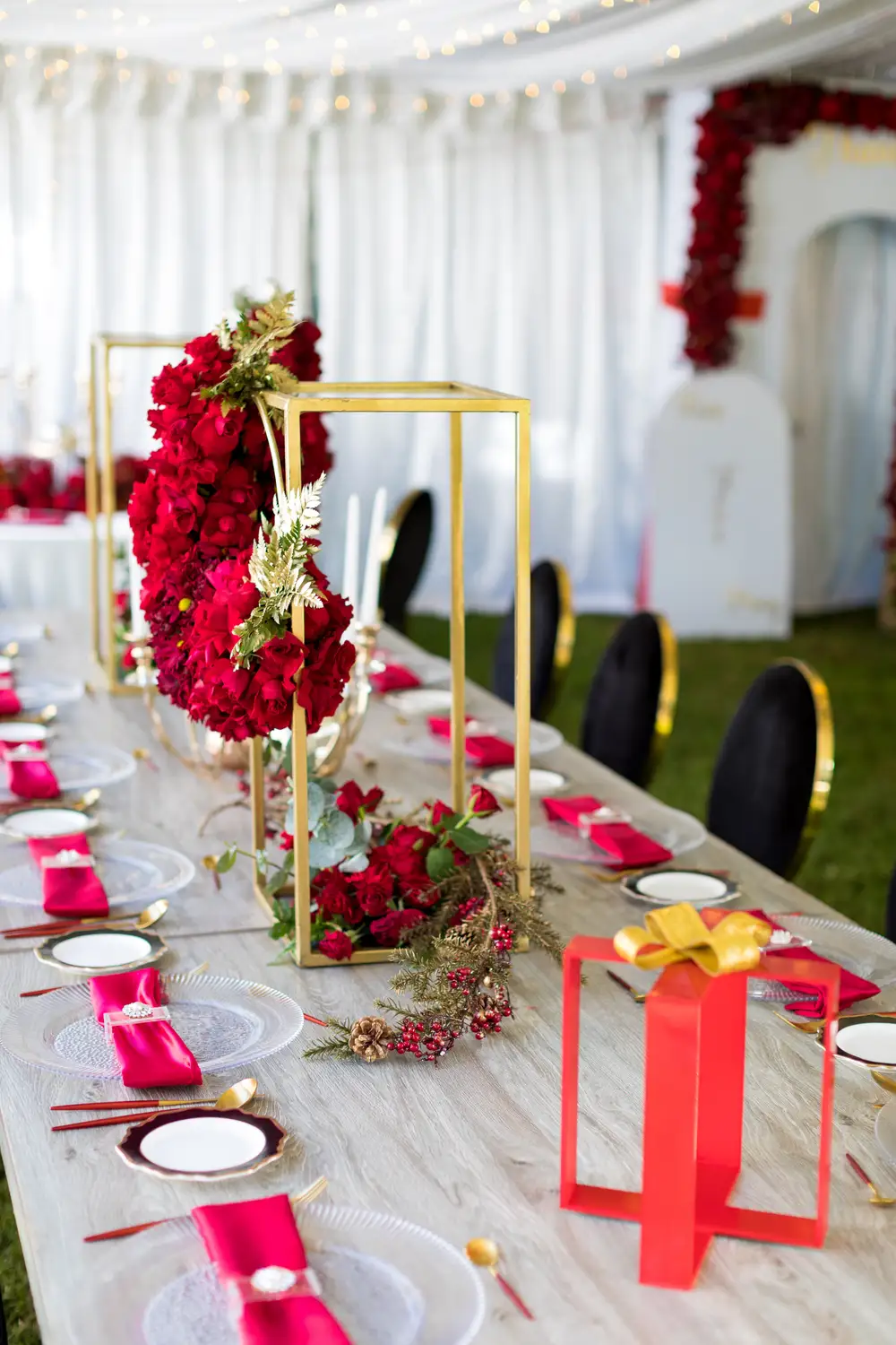 Dinning table at an event decorated with flowers