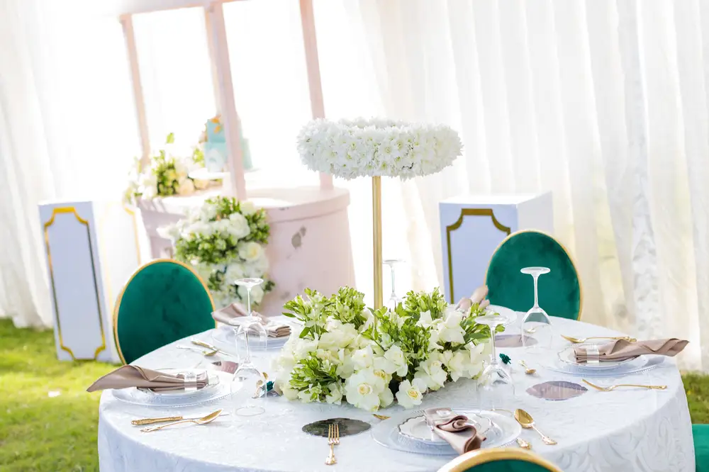 Green chairs and white table
