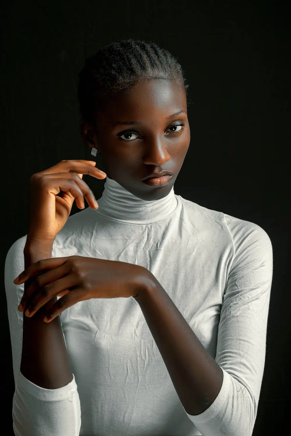 A Lady Model in White Turtle neck top