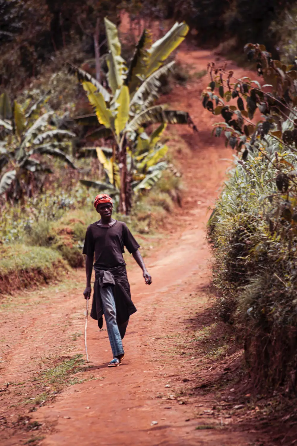 man walking on the road