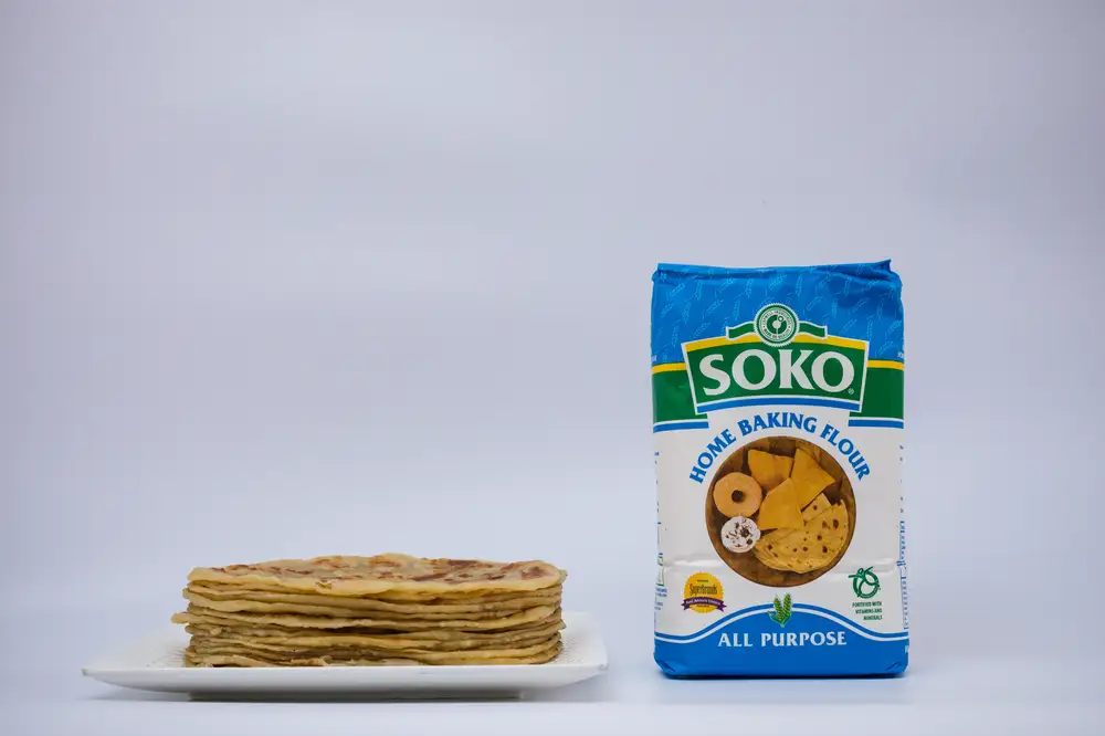 Plate of chapati and a pack of baking flour