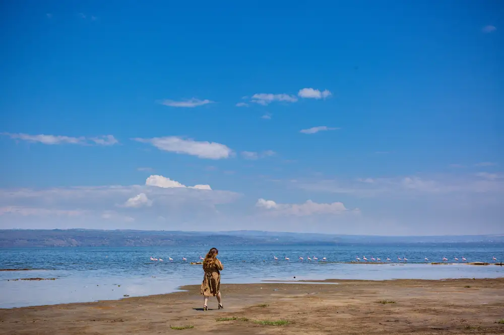 Woman standing by Nakuru lake