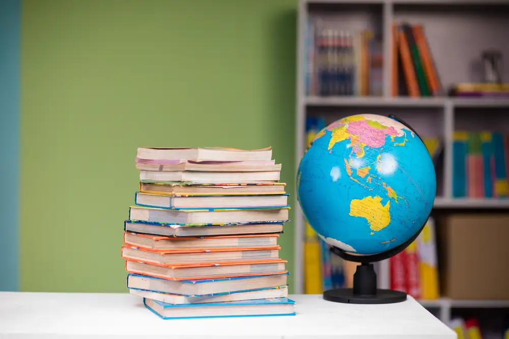 Pile pf books and a globe
