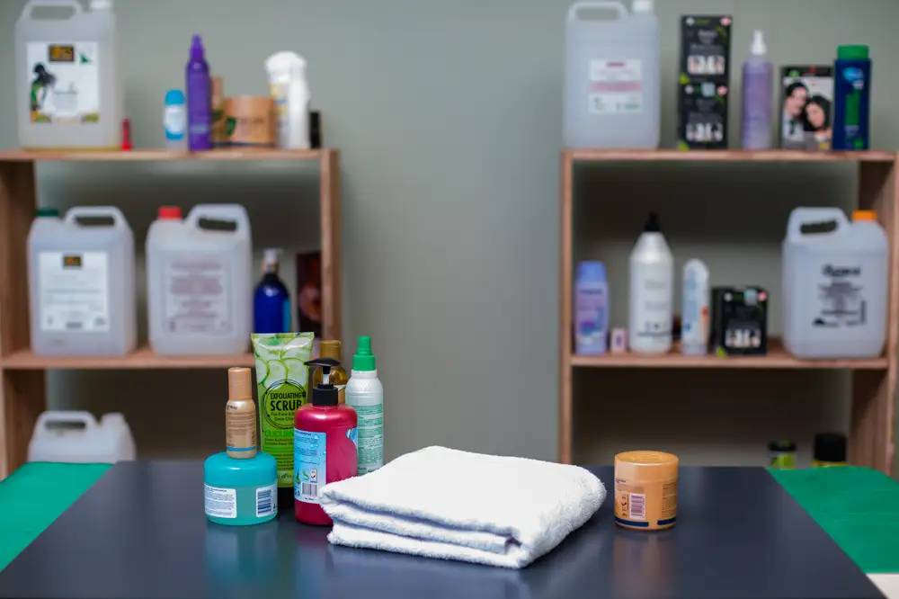 White towels and cosmetics toiletries on a table