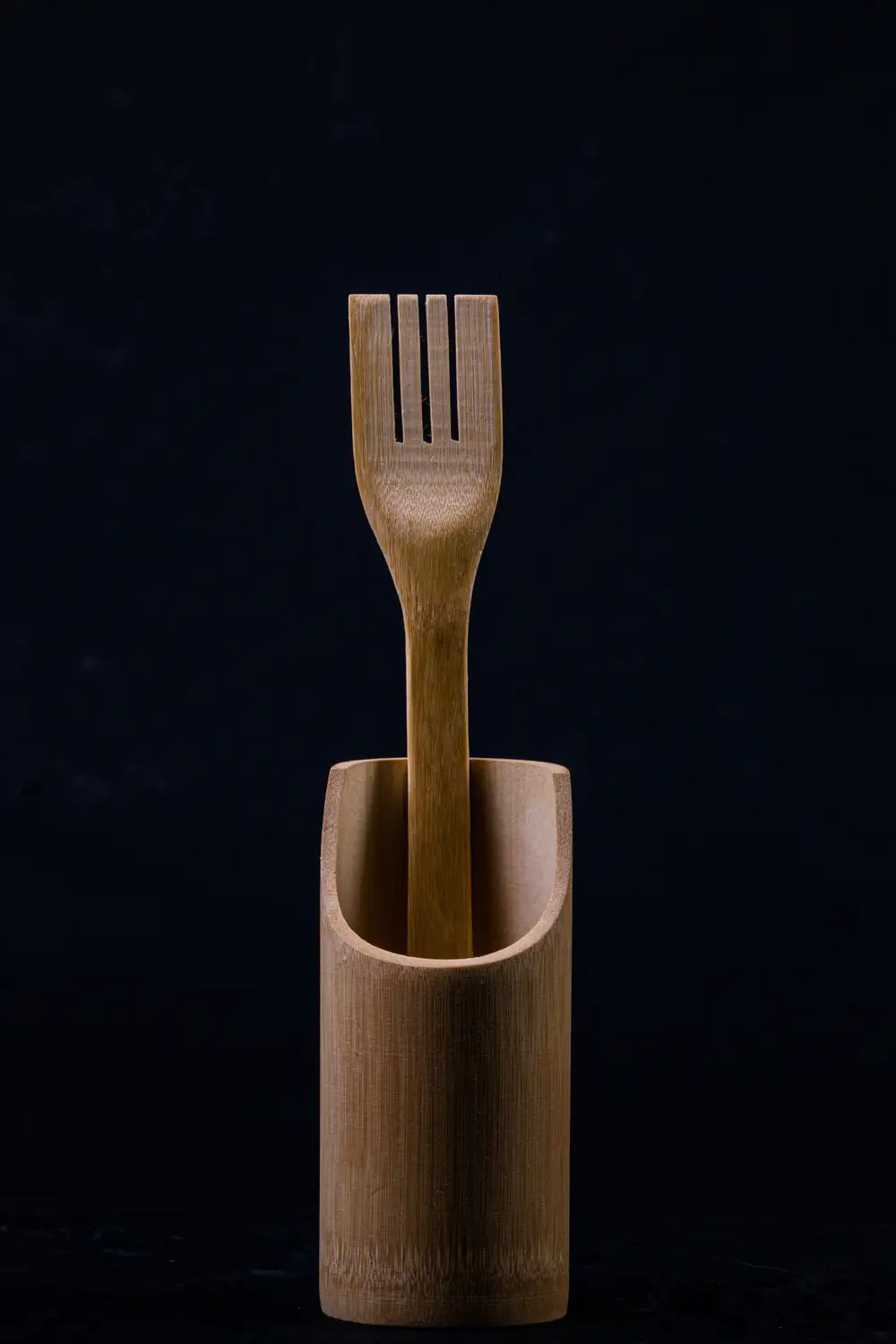 Wooden spoon in a conainer