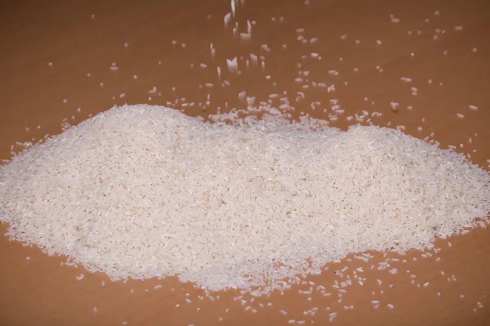 Rice grains poured on a surface