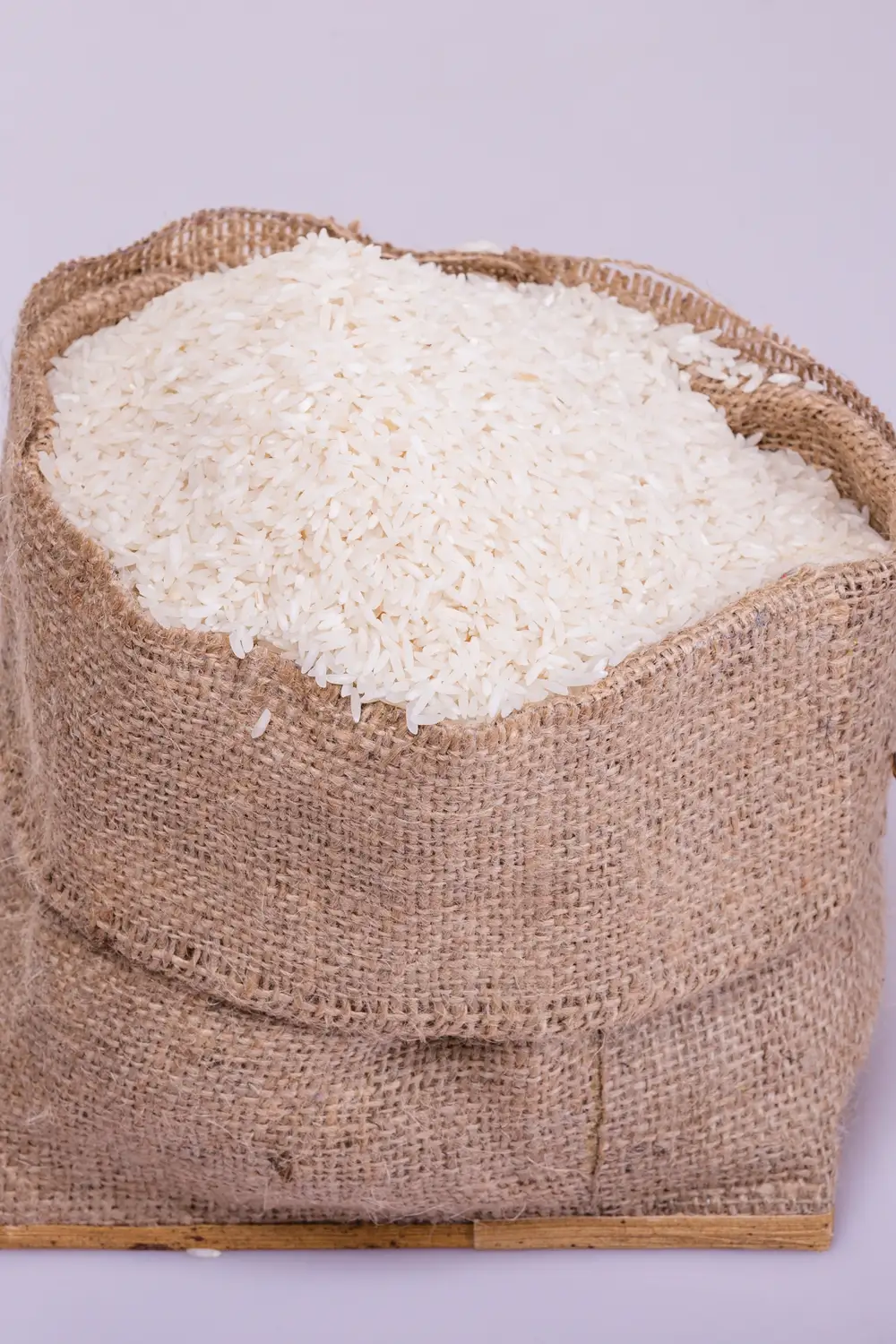 Sack bag filled with white rice grains