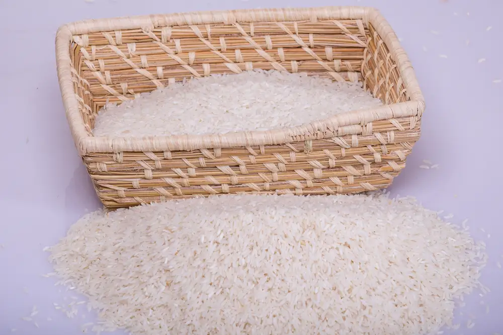 White rice in a basket and poured by the bakset