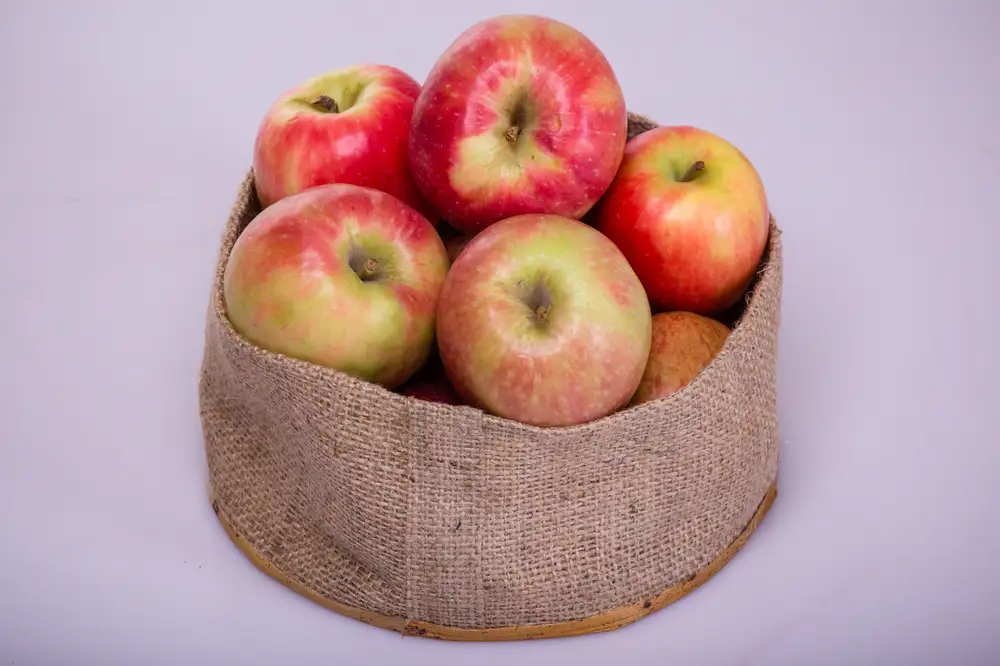 Bunch of apples in a brown sack