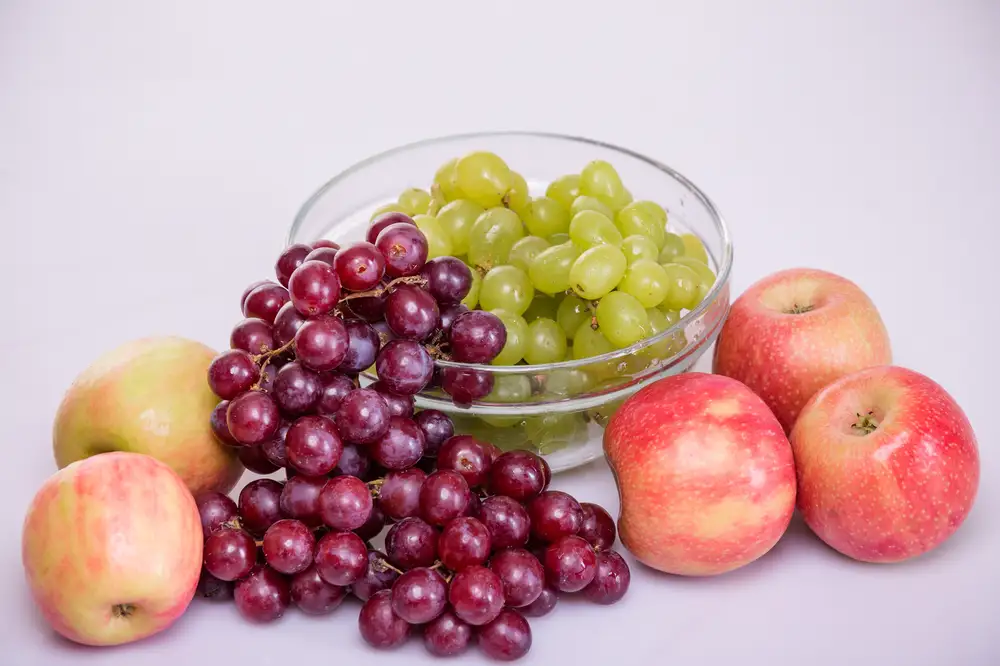 Apples and grapes in a bowl