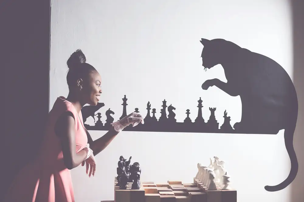 Vintage portrait of a lady with a chess board