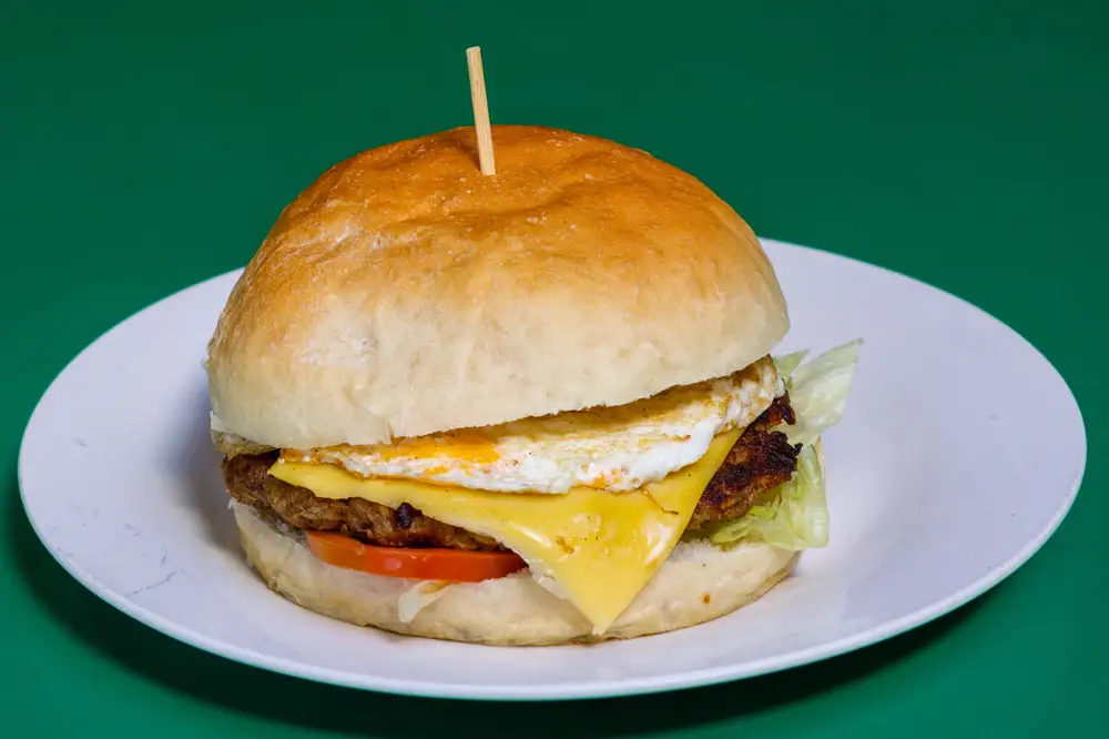 Cheese with fried egg and beef burger