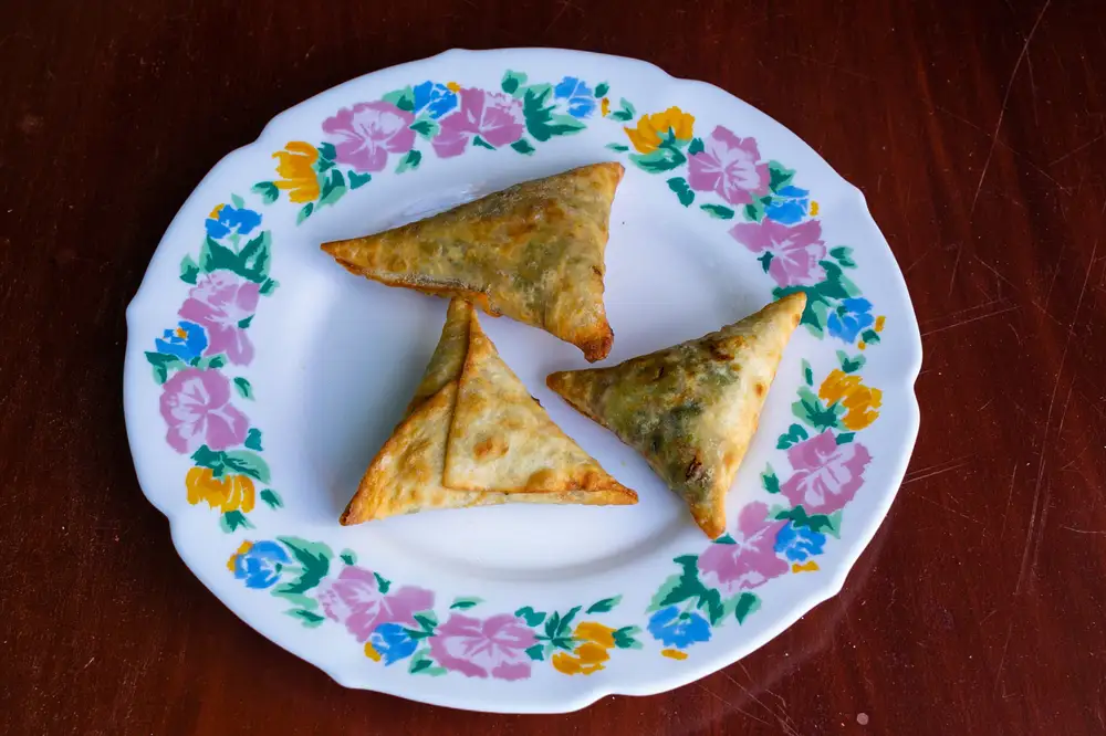Three prices of samosa in a plate