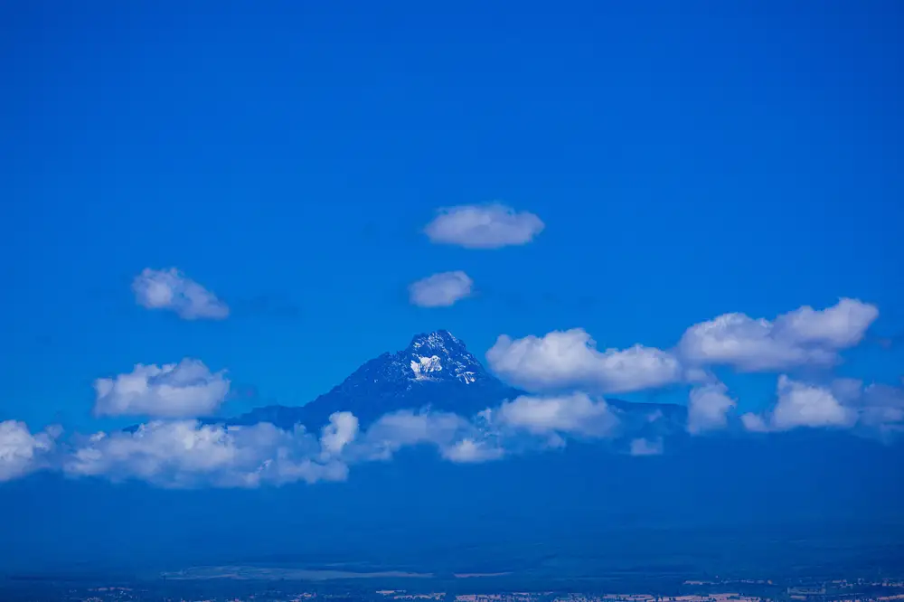 Mountain peak touching the sky