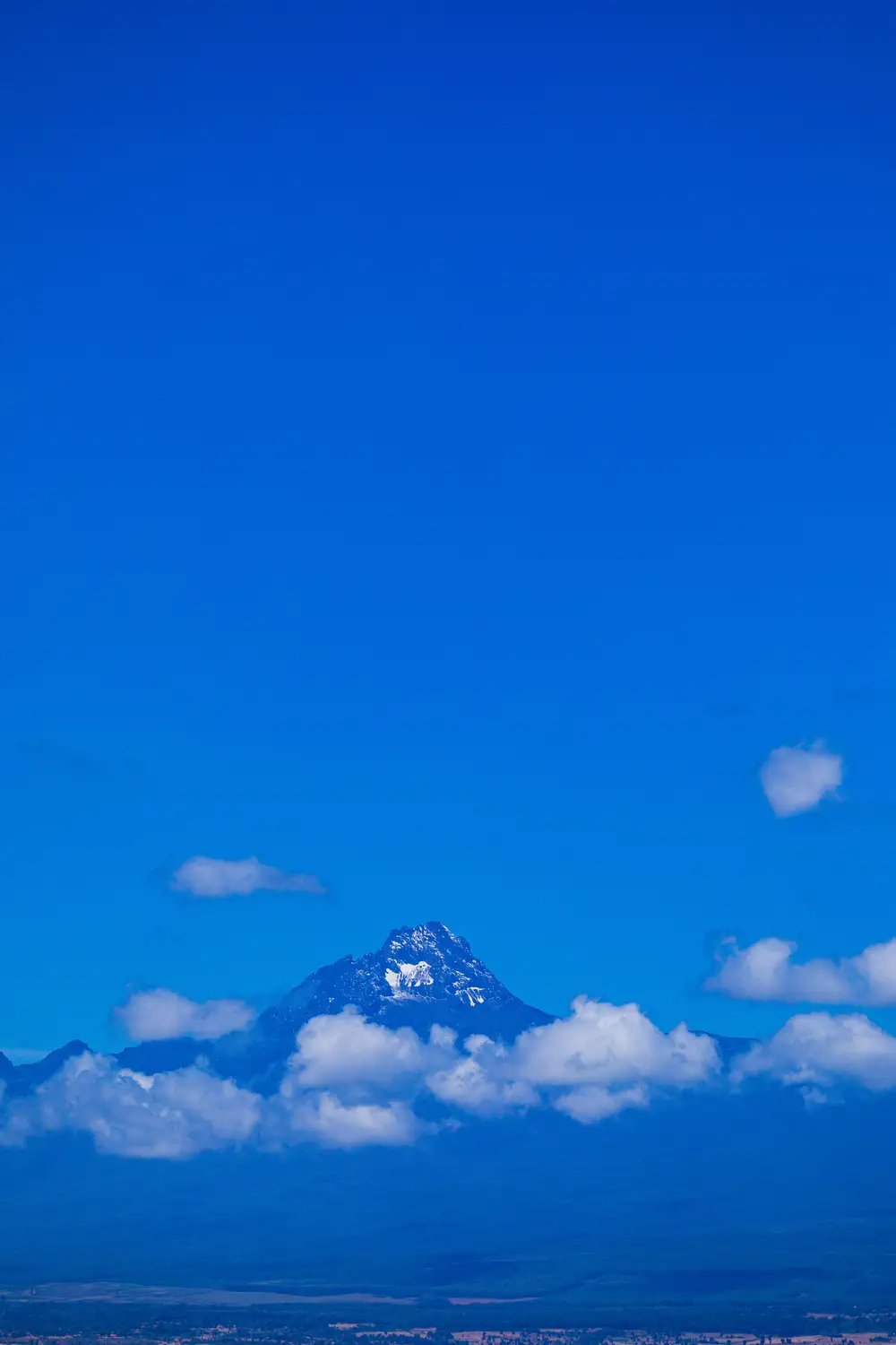 Portrait of a mountain and blue sky