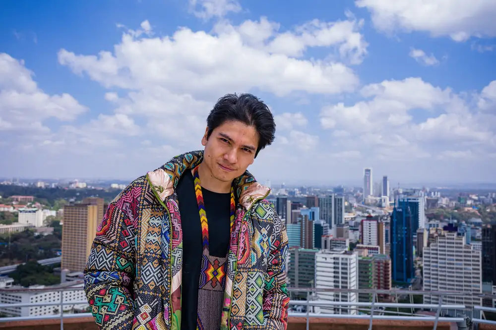 Young man wearing colourful jacket