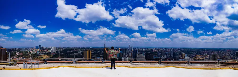 Man enjoying City view from rooftop