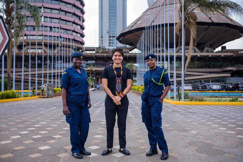Two officers and a tourist at Kenyatta convention center