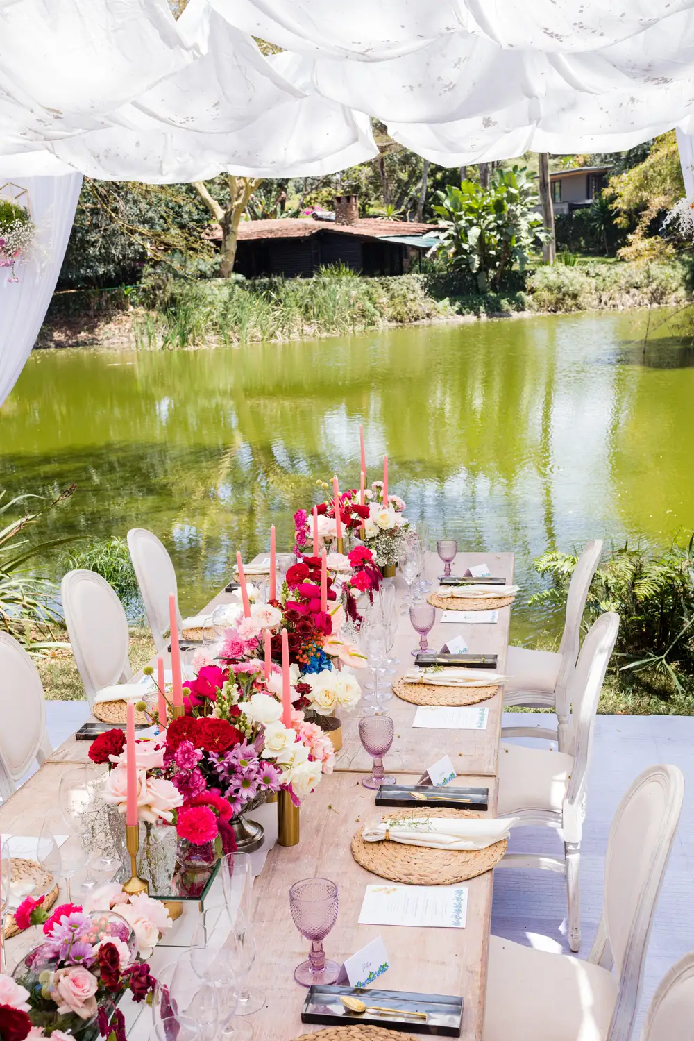 Long table by a river at a birthday party
