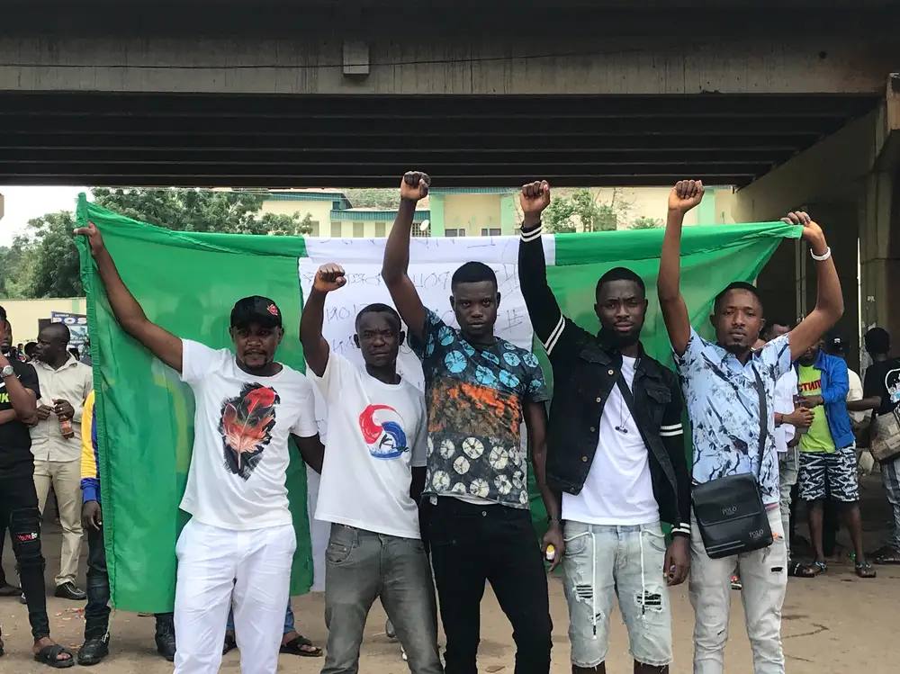 Protesters with Nigeria's flag