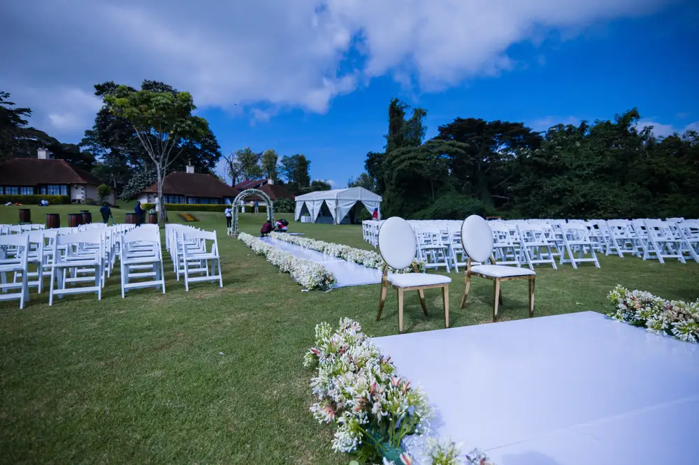 Couples chair in front of an isle with wedding ceremony
