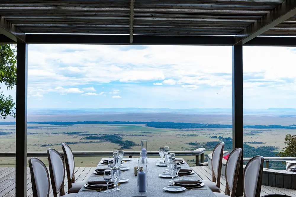 Fine Dinning set close to a Glass window with landscape scenery