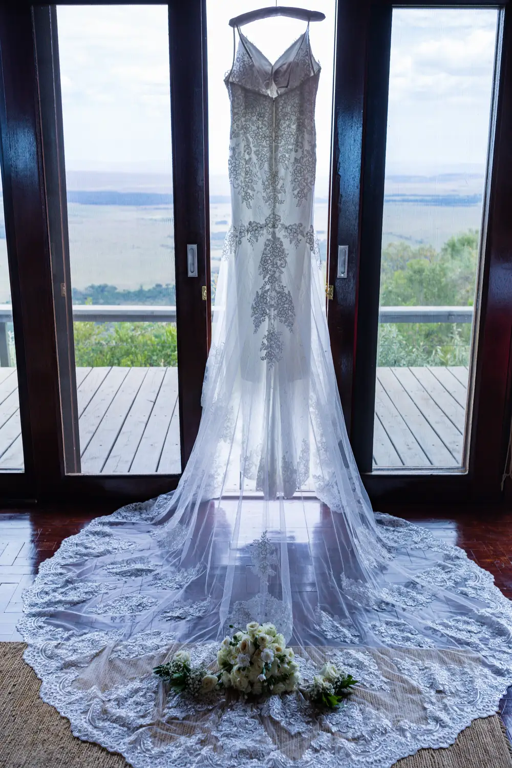 Patterned White dress in a room with glass windows