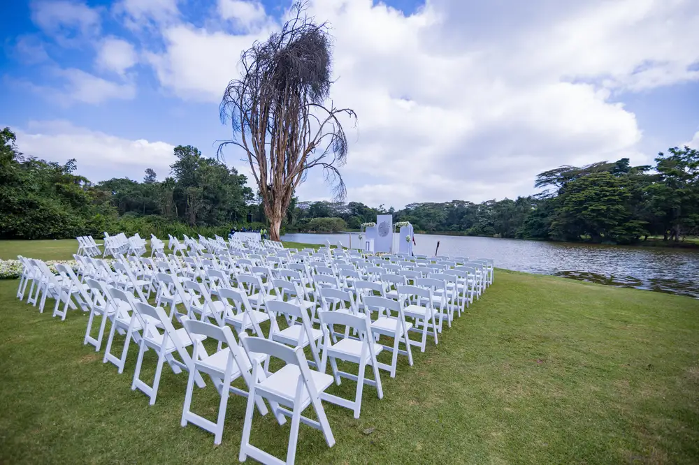 White Chairs at the bank of a lake