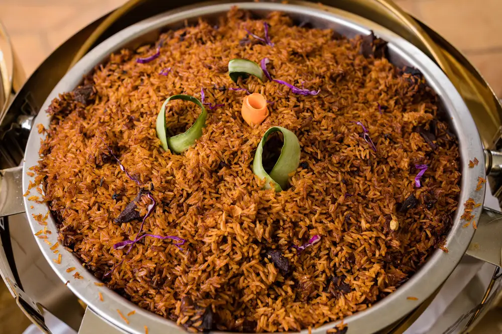 Mouth watering Jollof rice in a basin
