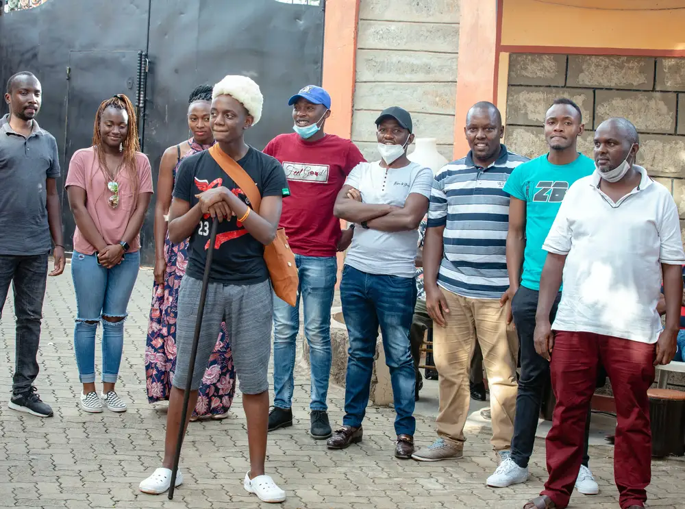 Group of men and a lday at an event