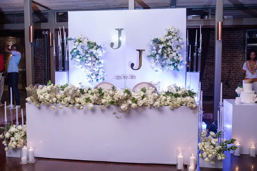 Indoor Wedding Table Flowers with couples initials